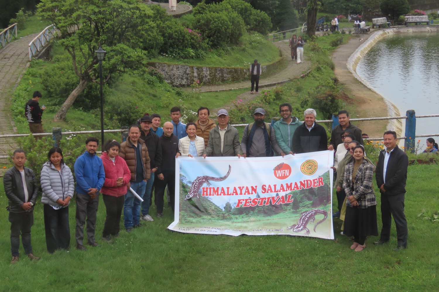 FOSEP members with the Himalayan Salamander Festival banner by Jorepokhri lake